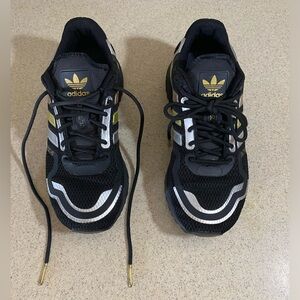 Adidas athletic shoes size 4.5.   Good condition